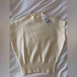 12th Tribe Cream Sleeveless Mock Neck Knit Top